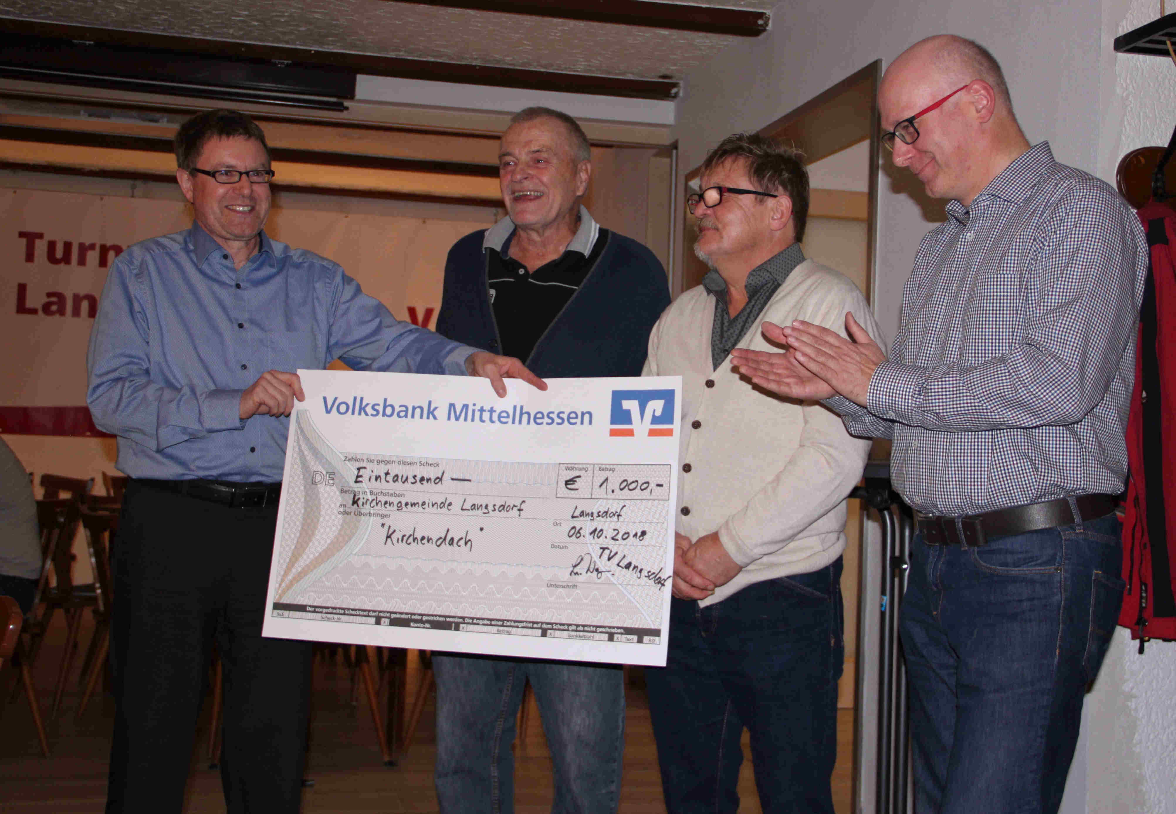 Übergabe Spendenscheck für Kirchendach